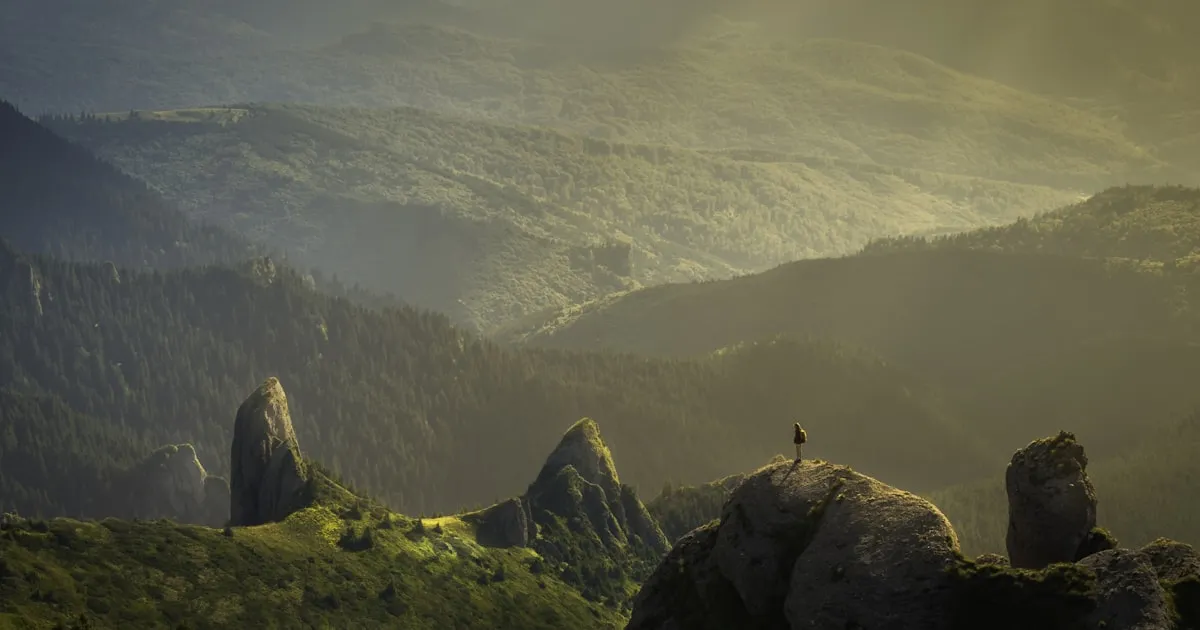 Aerial view from airplane window above the clouds
